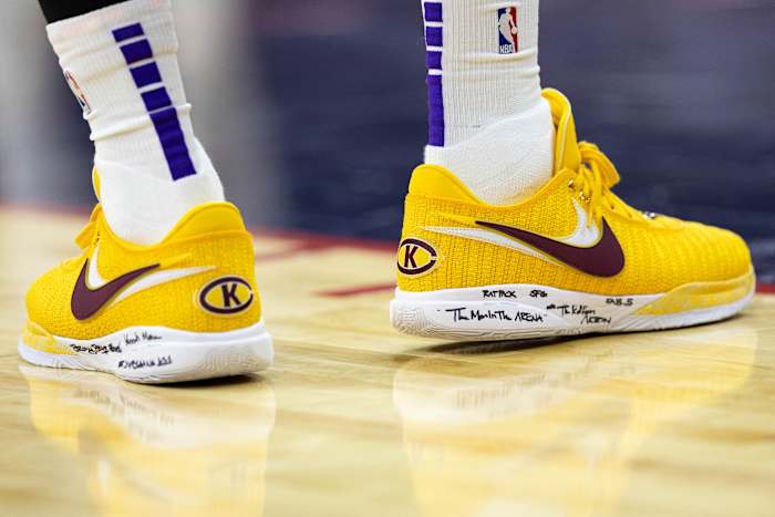 Los Angeles Lakers forward LeBron James' gold and maroon Nike sneakers.