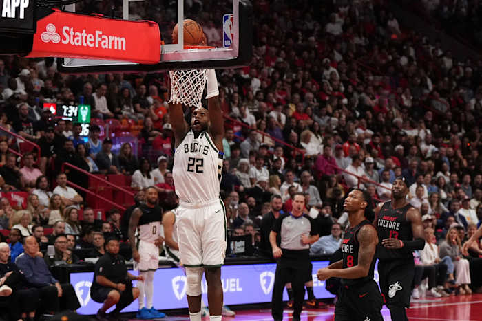 Milwaukee Bucks forward Khris Middleton (22) dunks the ball against the Miami Heat