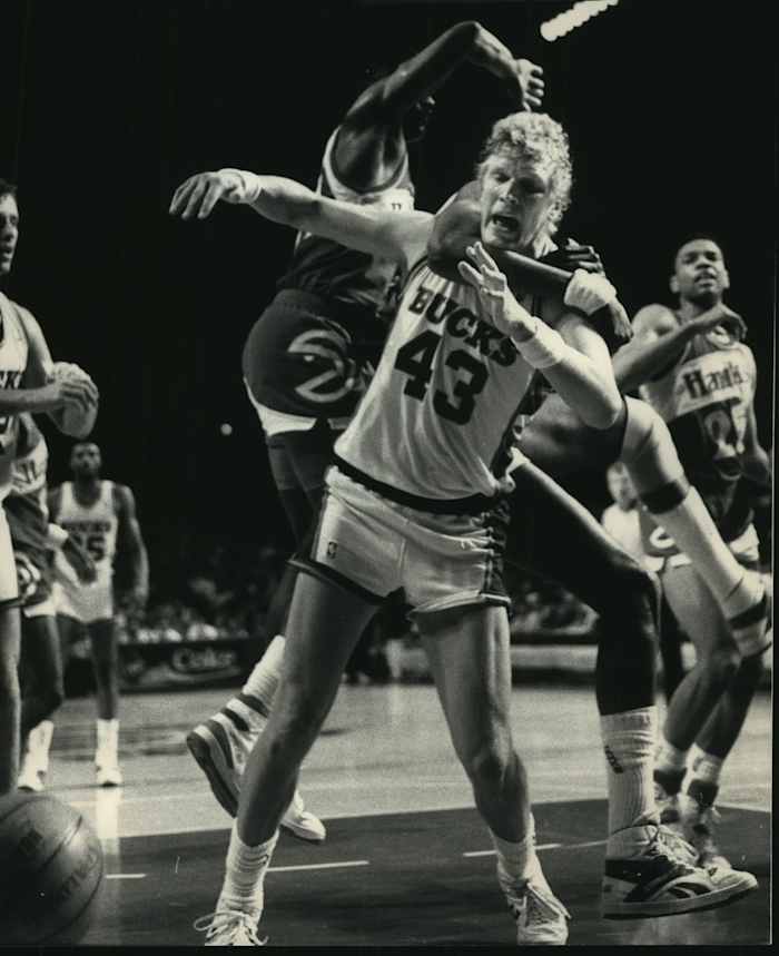 Atlanta center Tree Rollins gets the Bucks' Jack Sikma in a headlock during Game 4 of the first round of the Eastern Conference
