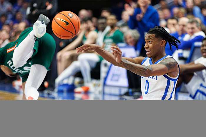 Nov 28, 2023; Lexington, Kentucky, USA; Kentucky Wildcats guard Rob Dillingham (0) passes the ball during the first half against the Miami (Fl) Hurricanes at Rupp Arena at Central Bank Center. Mandatory Credit: Jordan Prather-USA TODAY Sports