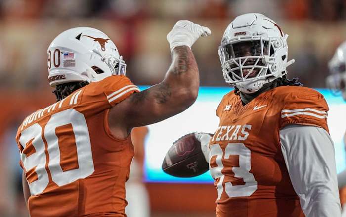 T'vondre Sweat and Byron Murphy celebrate vs. Texas Tech
