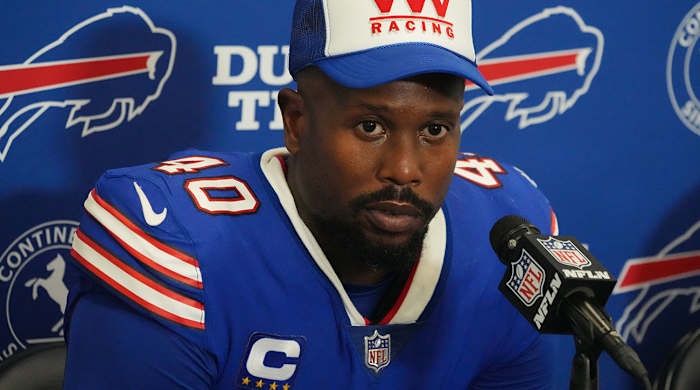 Von Miller wearing his Bills jersey at a press conference