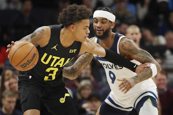 Nov 30, 2023; Minneapolis, Minnesota, USA; Utah Jazz guard Keyonte George (3) works around Minnesota Timberwolves guard Nickeil Alexander-Walker (9) in the first quarter at Target Center. 