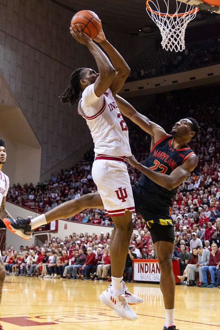 Indiana University's Trey Galloway (32) passes inside to Mackenzie Mgbako (21) during the first half of the Indiana versus Maryland men's basketball game at Simon Skjodt Assembly Hall.