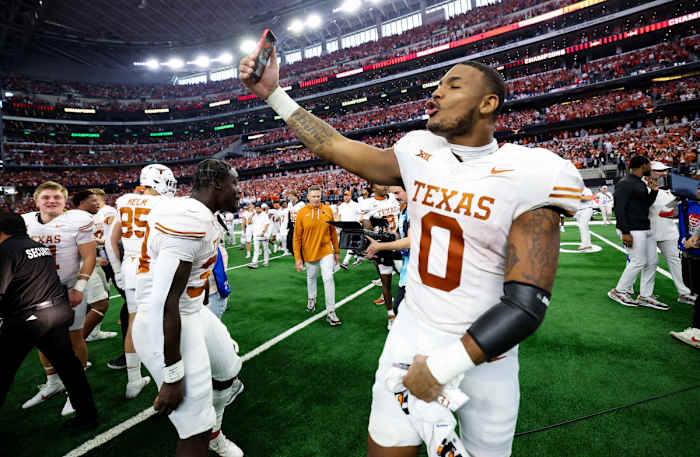 Texas Longhorns TE Ja'Tavion Sanders celebrates winning the Big 12 Conference championship at AT&T Stadium in Arlington, Texas
