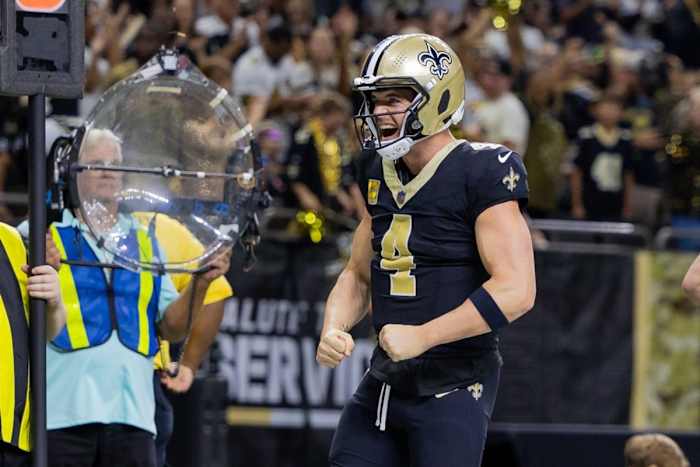 New Orleans Saints QB Derek Carr celebrates Taysom Hill's touchdown against the Chicago Bears.