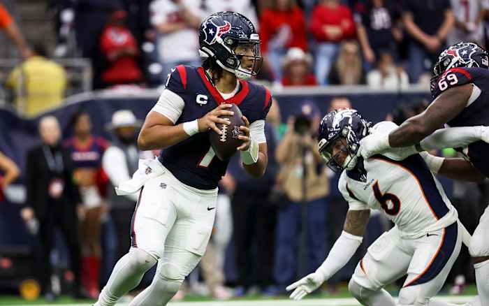 Houston Texans QB Stroud looking to deliver a pass against the Denver Broncos.