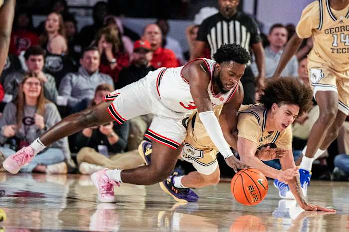 Dec 5, 2023; Athens, Georgia, USA; Georgia Bulldogs guard Noah Thomasson (3) and Georgia Tech Yellow Jackets guard Naithan George (2) dive for a ball on the floor during the second half at Stegeman Coliseum. Mandatory Credit: Dale Zanine-USA TODAY Sports