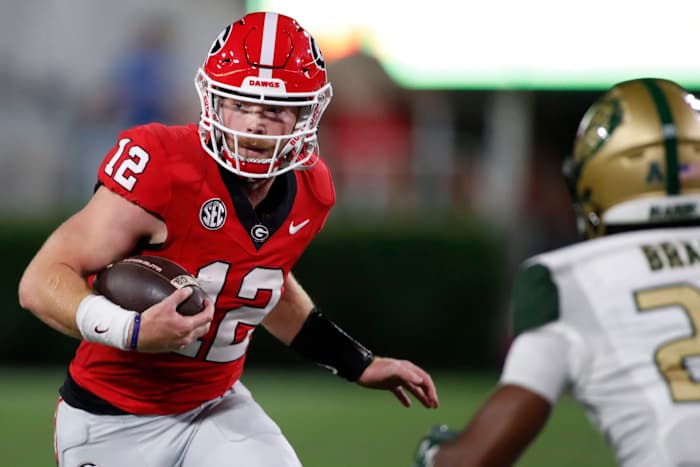 Georgia quarterback Brock Vandagriff runs with the ball during the second half against UAB in Athens, Ga., on Sept. 23, 2023.
