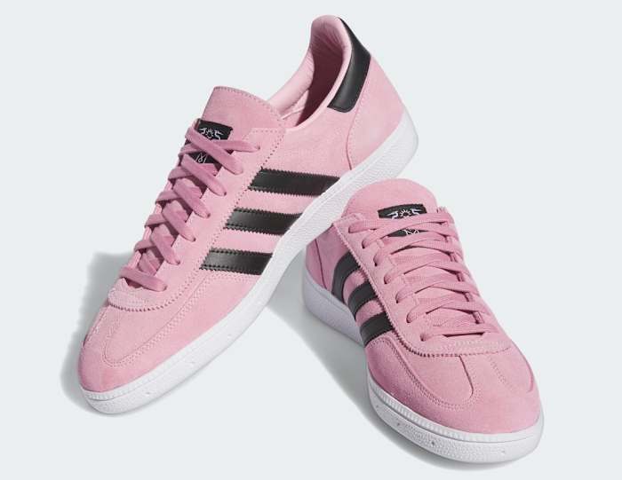 View of Lionel Messi's pink and black adidas sneakers.