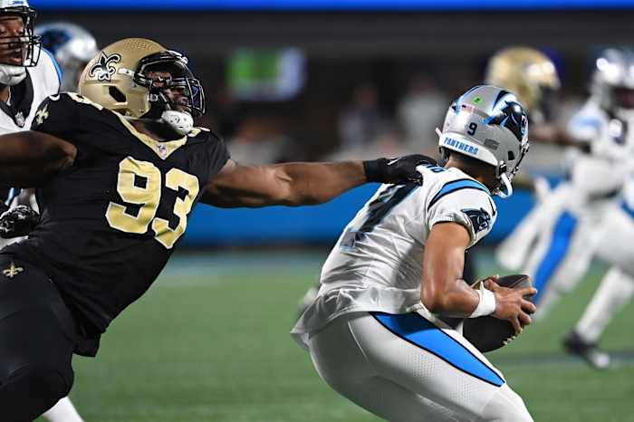Carolina Panthers quarterback Bryce Young (9) is pressured by New Orleans Saints defensive tackle Nathan Shepherd (93). Mandatory Credit: Bob Donnan-USA TODAY Sports