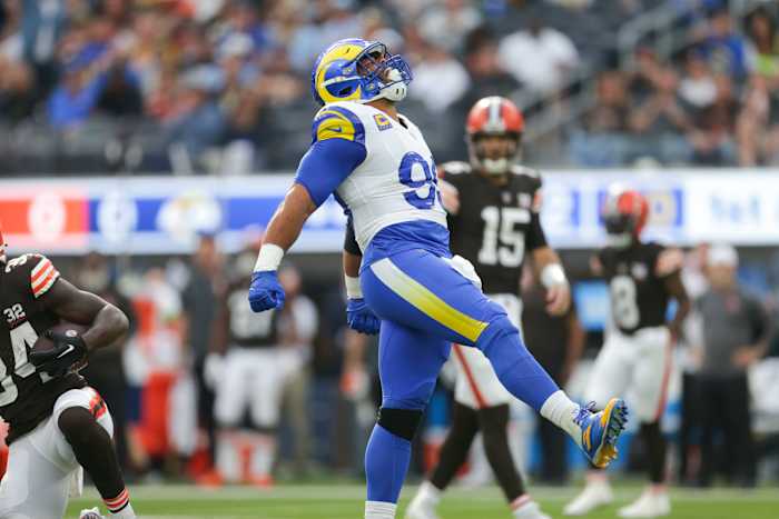 Los Angeles Rams defensive tackle Aaron Donald (99) celebrates in the first half in a game against the Cleveland Browns at SoFi Stadium.