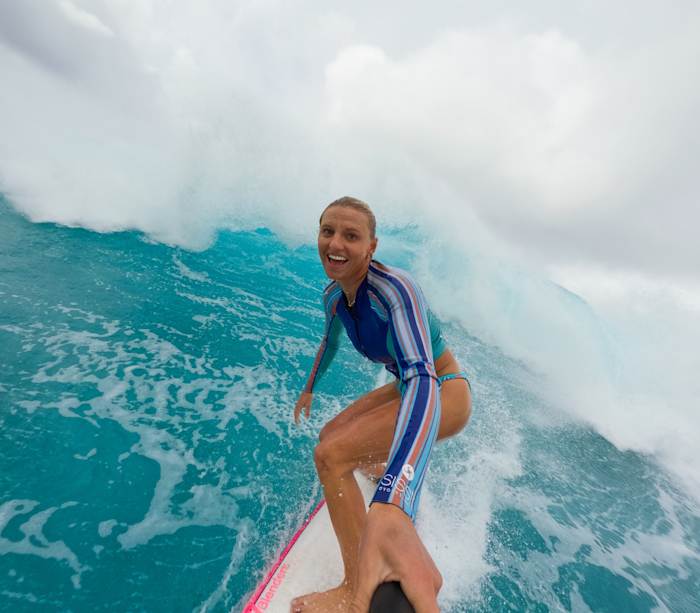 Lakey Peterson capturing an image with the GoPro Handler.