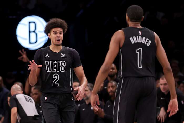 Brooklyn Nets forward Cameron Johnson (2) celebrates his three point shot against the Washington Wizards with forward Mikal Bridges (1) during the third quarter at Barclays Center.