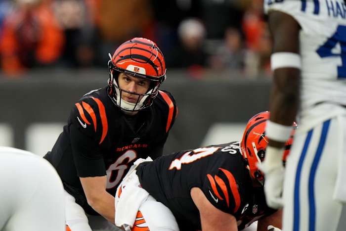 Dec. 10, 2023; Cincinnati, Ohio, USA; Cincinnati Bengals quarterback Jake Browning (6) checks the position of Indianapolis Colts safety Ronnie Harrison Jr. (48) in the fourth quarter at Paycor Stadium. Mandatory Credit - Kareem Elgazzar/USA TODAY Sports Network via The Cincinnati Enquirer