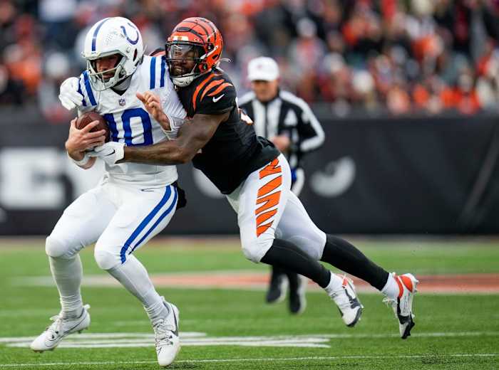 Cincinnati Bengals linebacker Germaine Pratt (57) stops Indianapolis Colts quarterback Gardner Minshew (10) in the 2nd quarter Sunday, December 10, 2023, at Paycor Stadium.