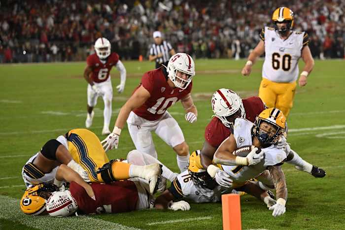 Nov 18, 2023; Stanford, California, USA; California Golden Bears running back Jaydn Ott (1) extends with the ball toward the goal line against the Stanford Cardinal during the third quarter at Stanford Stadium. Mandatory Credit: Robert Edwards-USA TODAY Sports