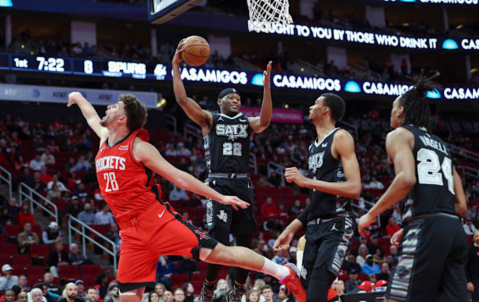 Dec 11, 2023; Houston, Texas, USA; San Antonio Spurs guard Malaki Branham (22) grabs a rebound during the first quarter against the Houston Rockets at Toyota Center.