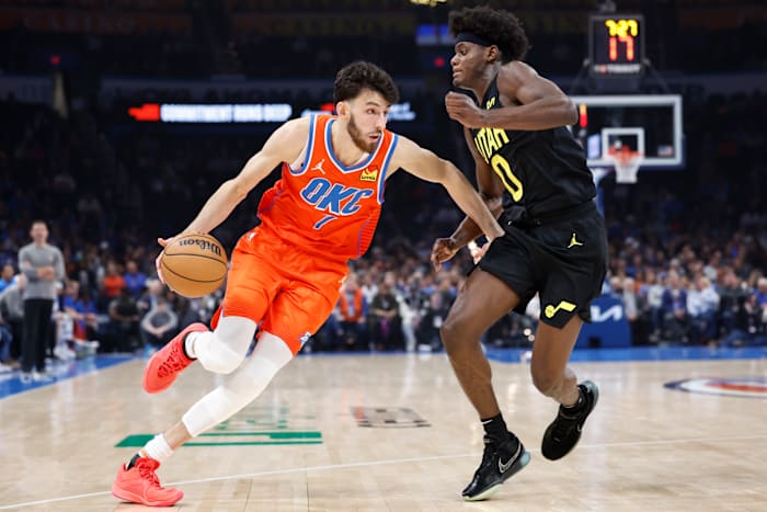 Dec 11, 2023; Oklahoma City, Oklahoma, USA; Oklahoma City Thunder forward Chet Holmgren (7) drives to the basket against Utah Jazz forward Taylor Hendricks (0) during the second quarter at Paycom Center.