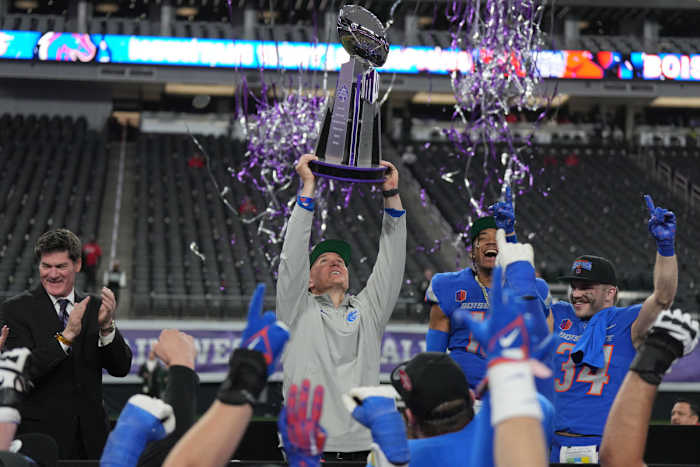 Dec 2, 2023; Las Vegas, NV, USA; Boise State Broncos head coach Spencer Danielson holds the Craig Thompson tropny after 44-20 victory over the UNLV Rebels in the Mountain West Championship at Allegiant Stadium. Mandatory Credit: Kirby Lee-USA TODAY Sports