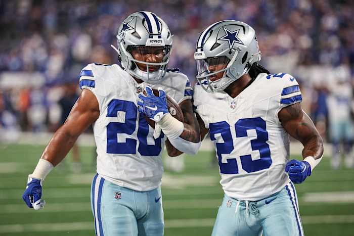 Tony Pollard (20) and Rico Dowdle (23) are proving to be a good running back tandem for the Cowboys.