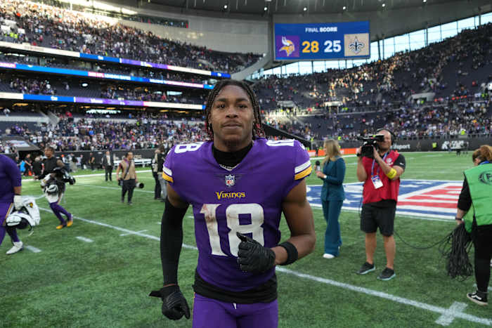 Oct 2, 2022; London, United Kingdom; Minnesota Vikings wide receiver Justin Jefferson (18) celebrates at the end of the game against the New Orleans Saints during an NFL International Series game at Tottenham Hotspur Stadium. The Vikings defeated the Saints 28-25.