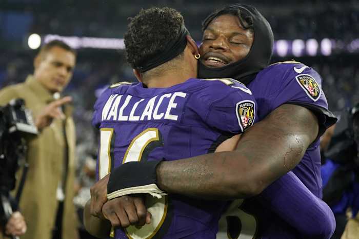 Baltimore Ravens wide receiver Tylan Wallace (16) and quarterback Lamar Jackson (8) celebrate after winning in overtime against the Los Angeles Rams at M&T Bank Stadium.
