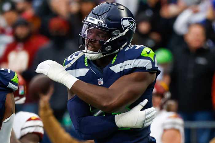 Seattle Seahawks linebacker Boye Mafe (53) celebrates following a sack against the Washington Commanders during the second quarter at Lumen Field.