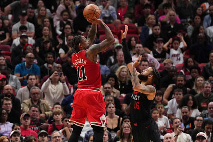 Chicago Bulls forward DeMar DeRozan (11) shoots over Miami Heat forward Caleb Martin (16) during the second half at Kaseya Center.