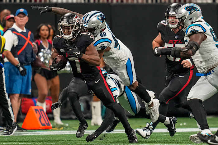 Sep 10, 2023; Atlanta, Georgia, USA; Atlanta Falcons running back Bijan Robinson (7) runs against the Carolina Panthers during the second half at Mercedes-Benz Stadium.