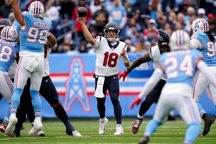 Houston Texans quarterback Case Keenum (18) throws against the Tennessee Titans during the second quarter at Nissan Stadium in Nashville, Tenn., Sunday, Dec. 17, 2023
