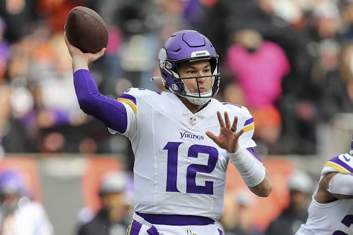 Dec 16, 2023; Cincinnati, Ohio, USA; Minnesota Vikings quarterback Nick Mullens (12) throws a pass against the Cincinnati Bengals in the first half at Paycor Stadium.