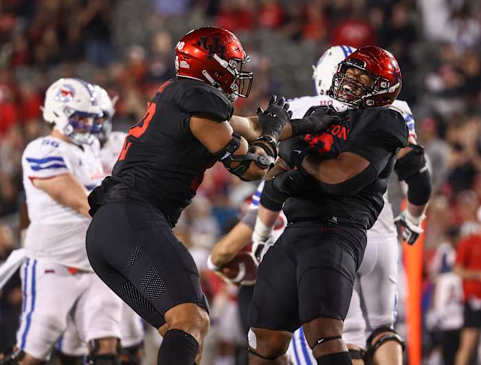 Oct 30, 2021; Houston, Texas, USA; Houston Cougars defensive lineman Chidozie Nwankwo (10) reacts after a play during the fourth quarter against the Southern Methodist Mustangs at TDECU Stadium