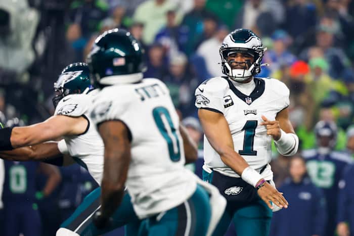 Philadelphia Eagles quarterback Jalen Hurts (1) passes against the Seattle Seahawks during the first quarter at Lumen Field.