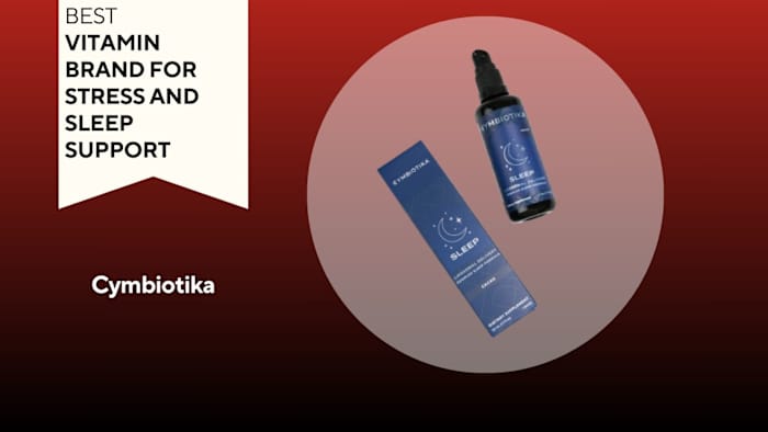 Blue box next to a black pump bottle with a blue label, both have white writing that says "SLEEP" with a drawing of a moon and stars