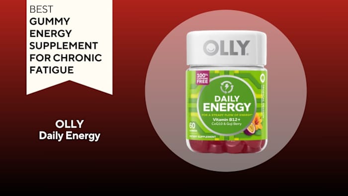 Clear pill bottle with green label that says "DAILY ENERGY" against a red background