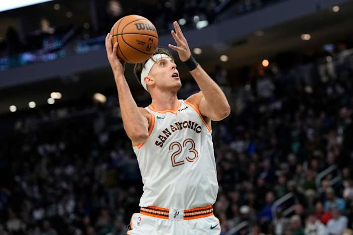 Dec 19, 2023; Milwaukee, Wisconsin, USA; San Antonio Spurs center Zach Collins (23) shoots during the third quarter against the Milwaukee Bucks at Fiserv Forum.