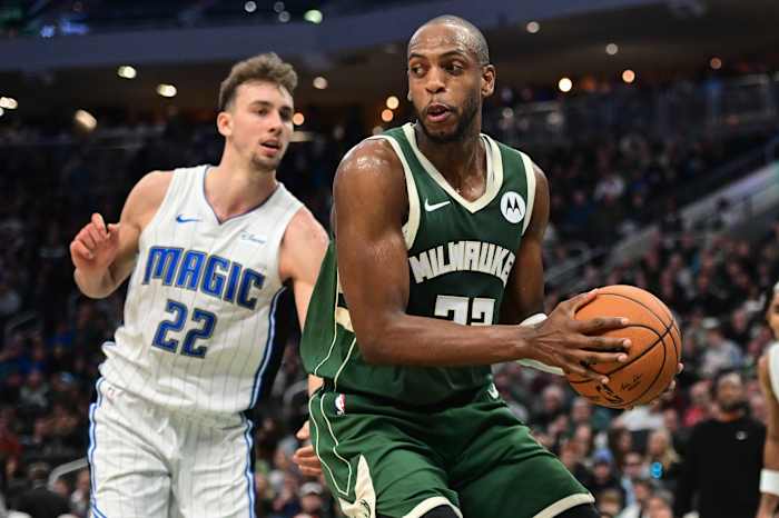 Milwaukee Bucks center Khris Middleton (22) looks for a shot against Orlando Magic forward Franz Wagner (22)