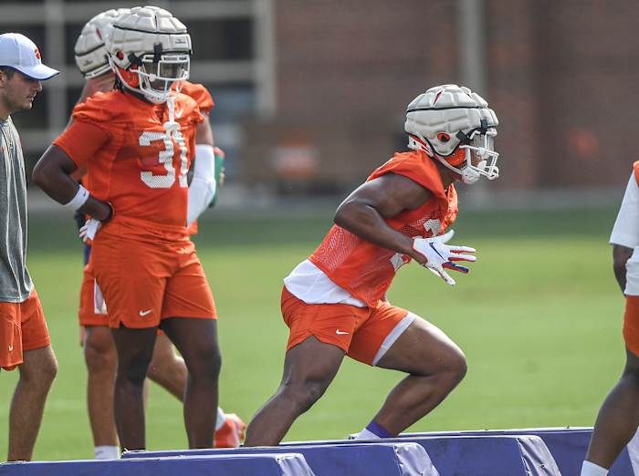 Clemson linebacker Kobe McCloud (31) watches as linebacker TJ Dudley (26) runs in a drill during the first day of fall football practice at the Allen Reeves Complex in Clemson Friday, August 5, 2022. Clemson Football First Day Fall Practice