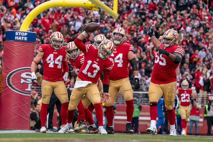 San Francisco 49ers quarterback Brock Purdy (13) celebrates after scoring a touchdown against the Tampa Bay Buccaneers during the second quarter at Levi's Stadium. Mandatory Credit: Kyle Terada-USA TODAY Sports