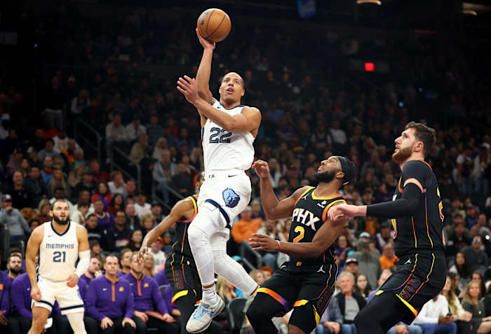 Dec 2, 2023; Phoenix, Arizona, USA; Memphis Grizzlies guard Desmond Bane (22) against the Phoenix Suns in the first half at Footprint Center. Mandatory Credit: Mark J. Rebilas-USA TODAY Sports