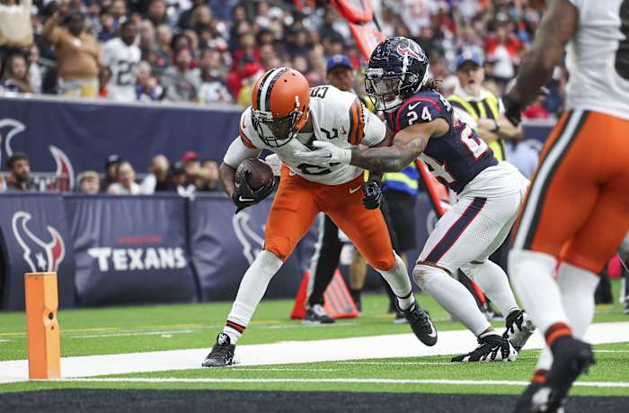 Dec 24, 2023; Houston, Texas, USA; Cleveland Browns wide receiver Amari Cooper (2) steps out of bounds after a reception as Houston Texans cornerback Derek Stingley Jr. (24) defends during the fourth quarter at NRG Stadium.