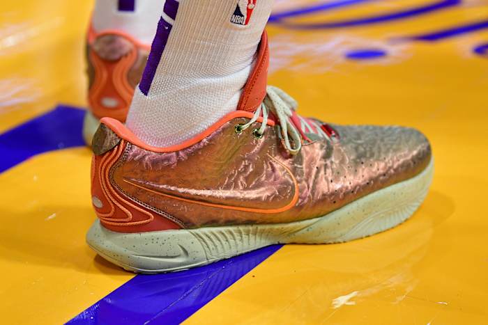 Los Angeles Lakers forward LeBron James's red and gold Nike sneakers.