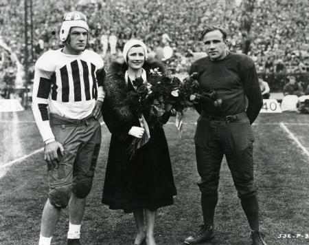 Alabama's Charles Clement and Elmer Schwartz of Washington State, meet with actress Irene Dunne prior to the 1931 Rose Bowl.