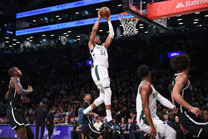 Milwaukee Bucks forward Giannis Antetokounmpo (34) goes up for a dunk during the second half against the Brooklyn Nets