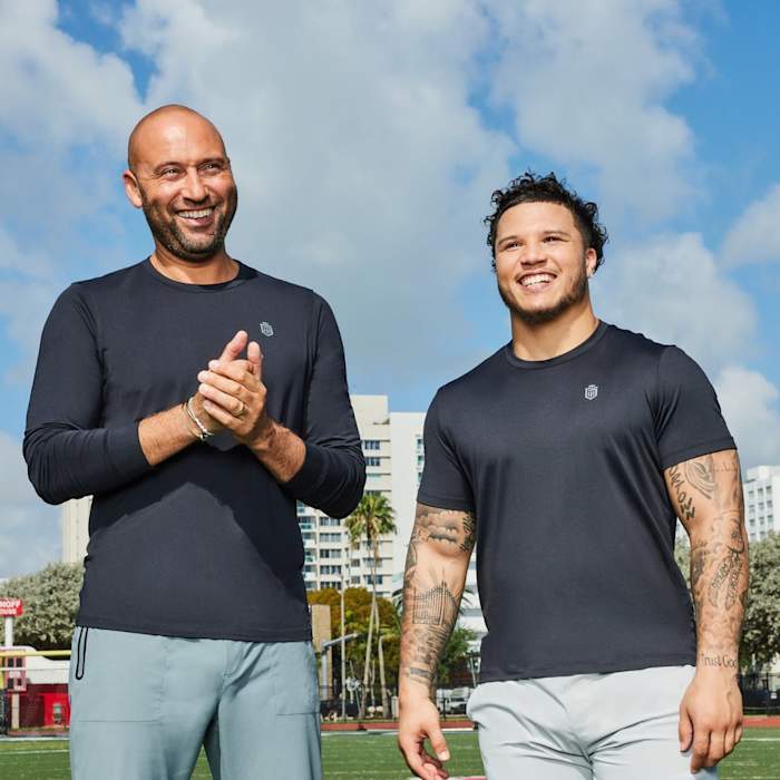 Derek Jeter and Blake Corum in a Greatness Wins photo shoot.