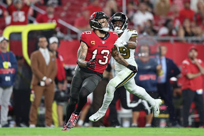 New Orleans Saints cornerback Paulson Adebo (29) covers Tampa Bay Buccaneers wide receiver Mike Evans (13). Mandatory Credit: Nathan Ray Seebeck-USA TODAY Sports