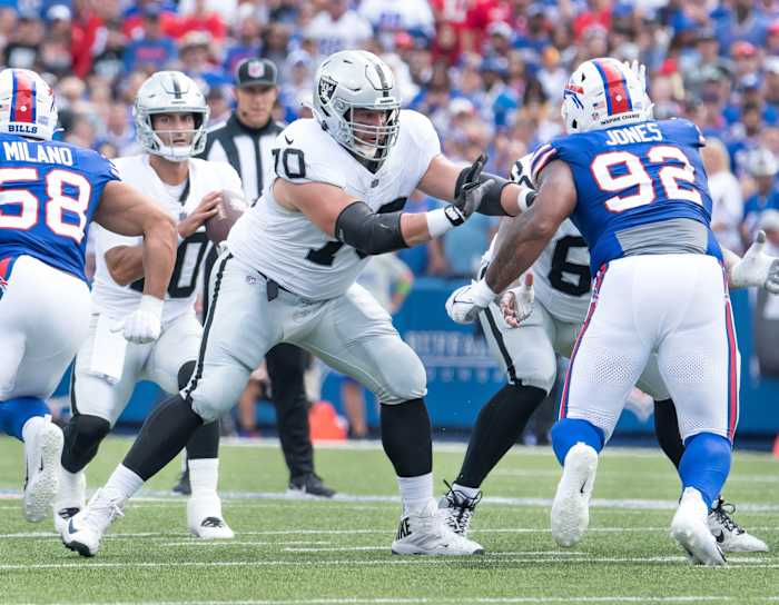 Sep 17, 2023; Orchard Park, New York, USA; Las Vegas Raiders guard Greg Van Roten (70) blocks Buffalo Bills defensive tackle DaQuan Jones (92) for quarterback Jimmy Garoppolo (10) in the second quarter at Highmark Stadium.