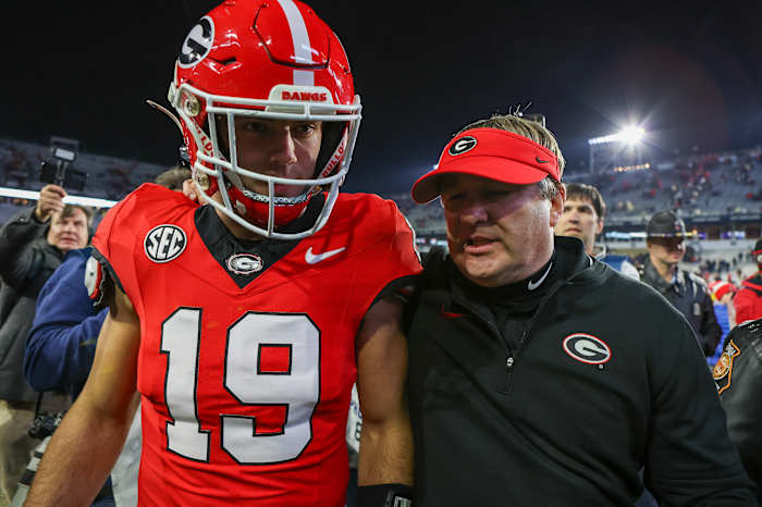 Nov 25, 2023; Atlanta, Georgia, USA; Georgia Bulldogs tight end Brock Bowers (19) and head coach Kirby Smart walk off the field after defeating the Georgia Tech Yellow Jackets at Bobby Dodd Stadium at Hyundai Field. Mandatory Credit: Brett Davis-USA TODAY Sports