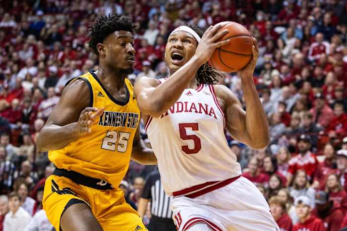 Indiana Hoosiers forward Malik Reneau (5) shoots the ball while Kennesaw State Owls forward Rongie Gordon (25) defends in the first half at Simon Skjodt Assembly Hall.